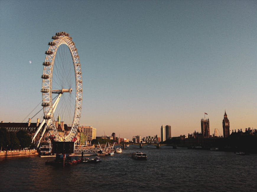 Stunning sunset over the London Eye and Houses of Parliament on the Thames.